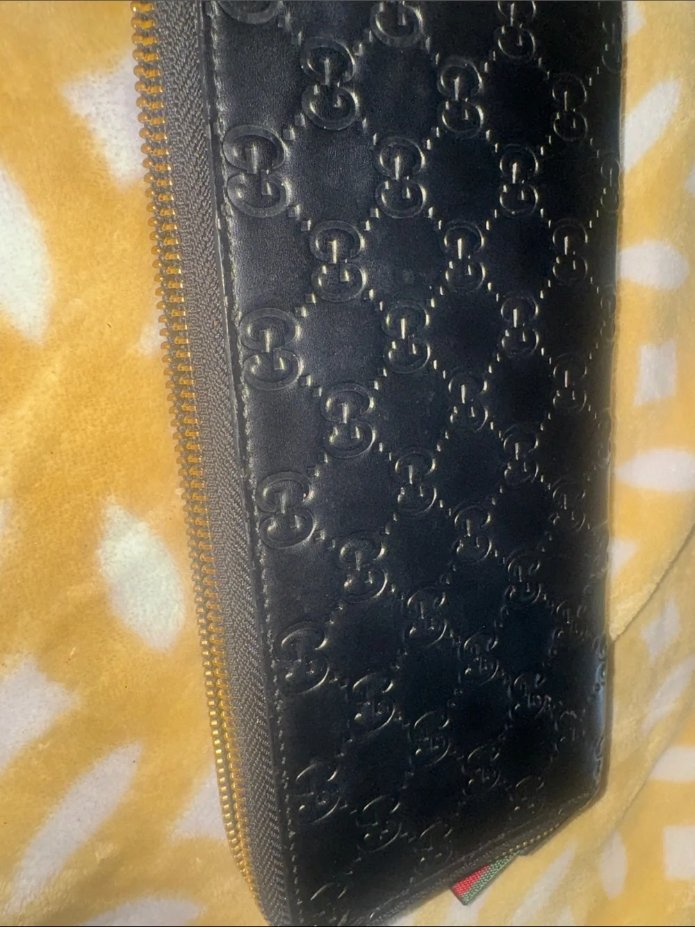 Gucci Black Embossed GG Zip Around Wallet